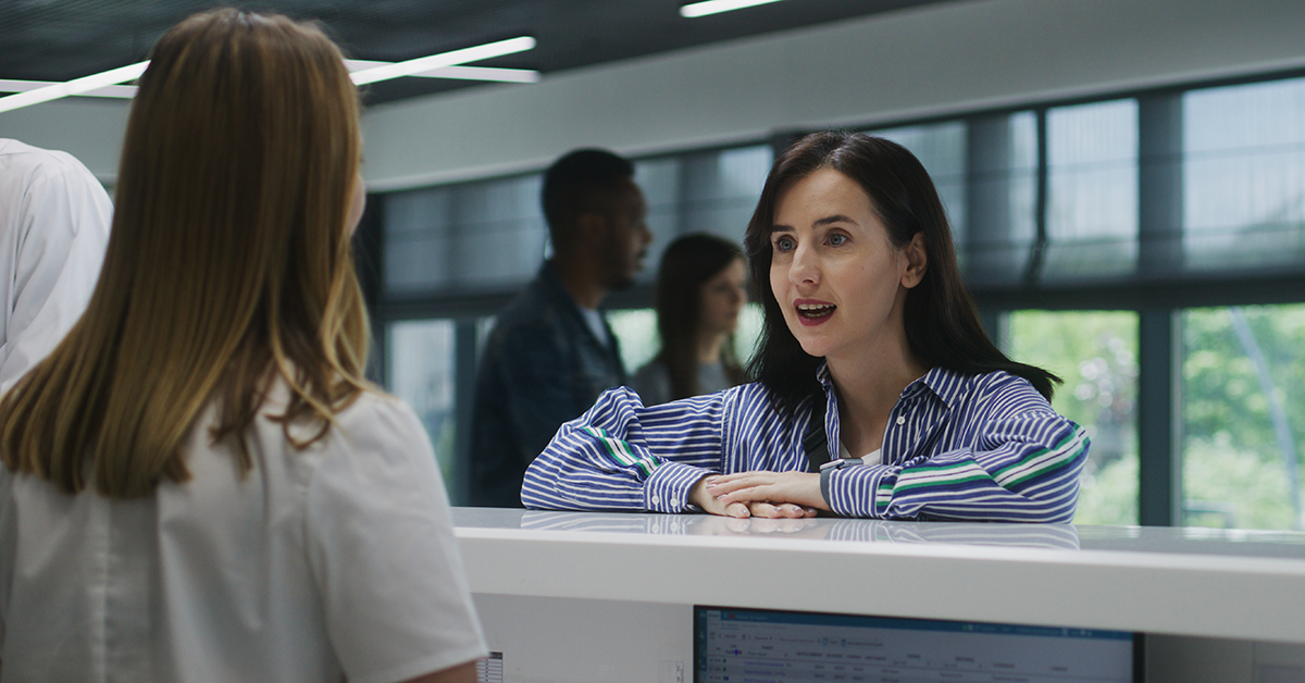 customer at a lobby service desk