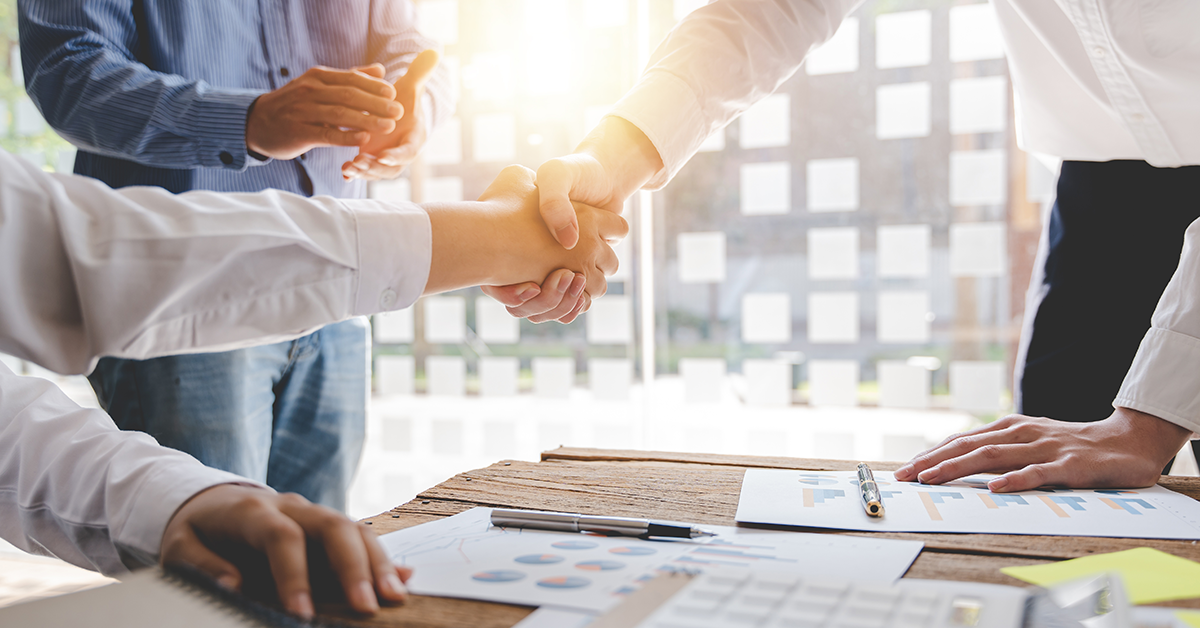 handshake in a business office